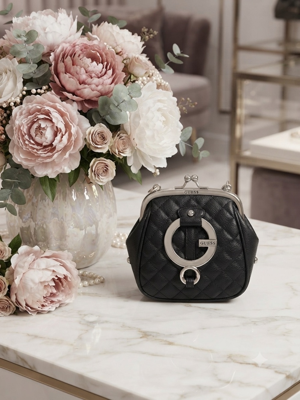 GUESS Black Quilted Mini kiss-lock handbag